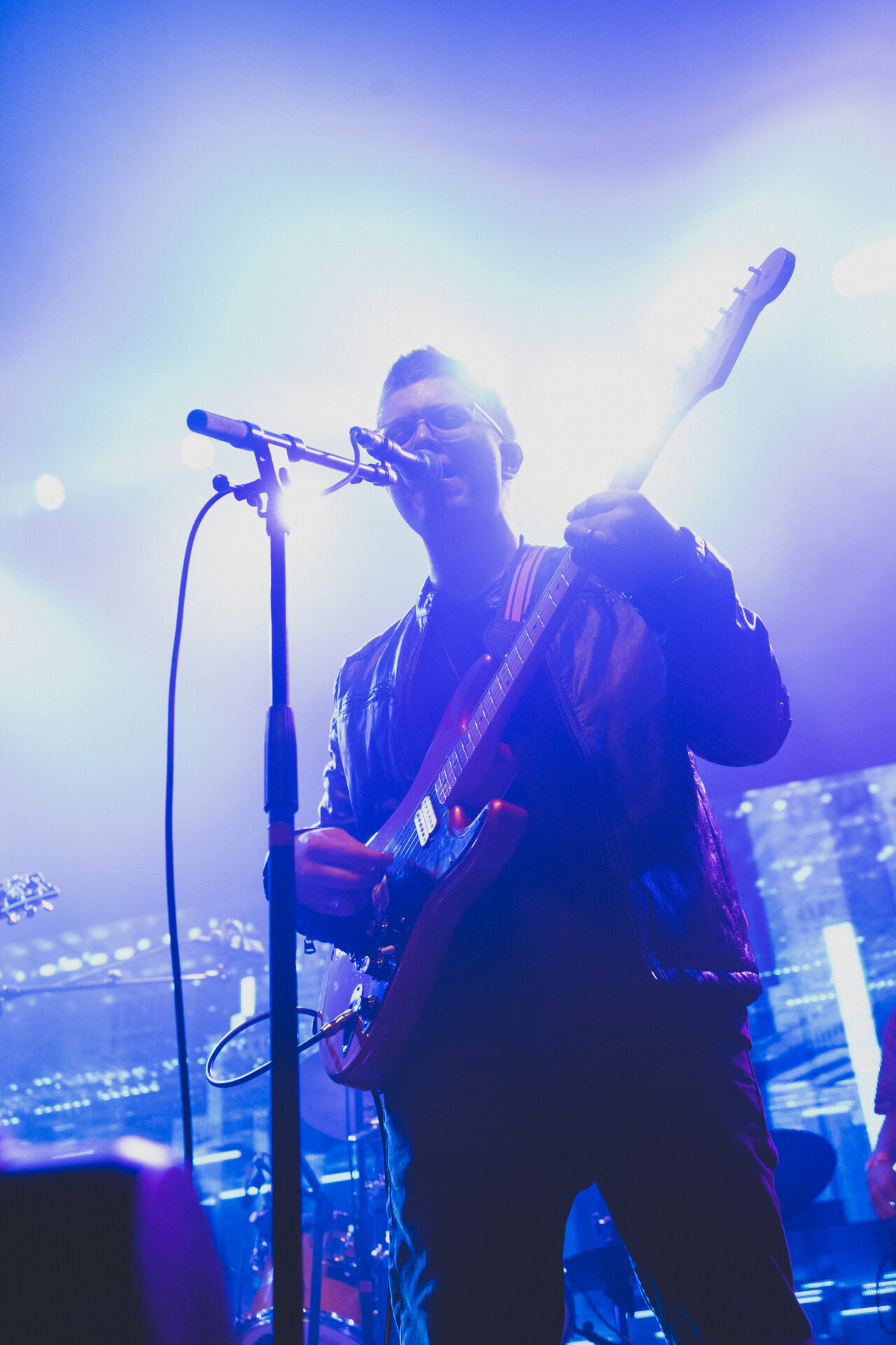 Dr. Caleb Kronen playing the guitar