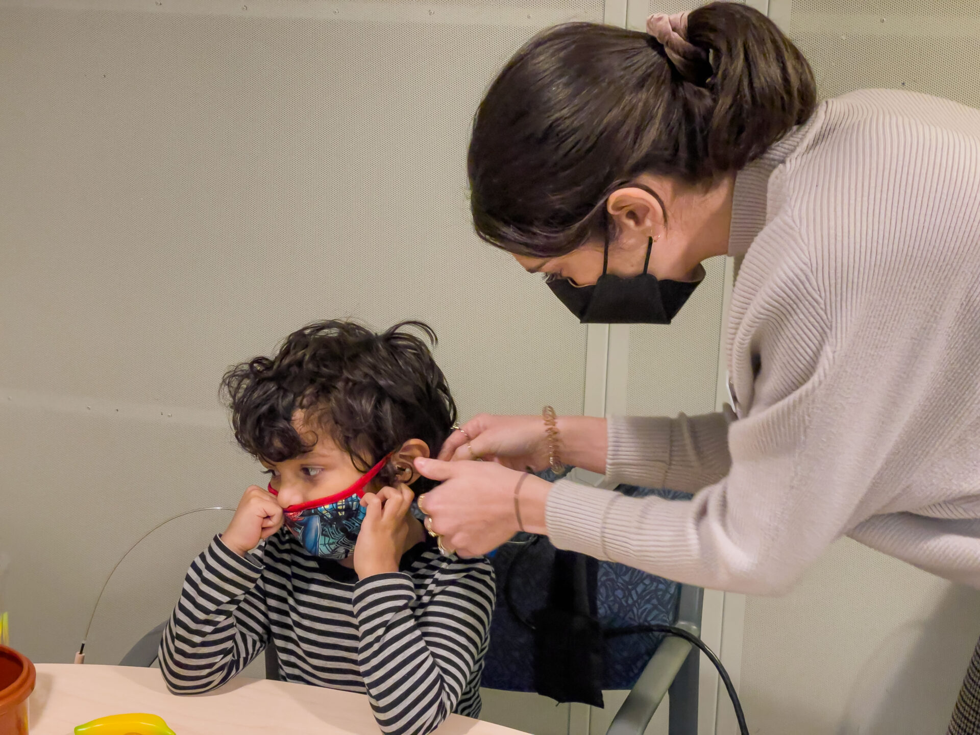 Pediatrician checking a boy